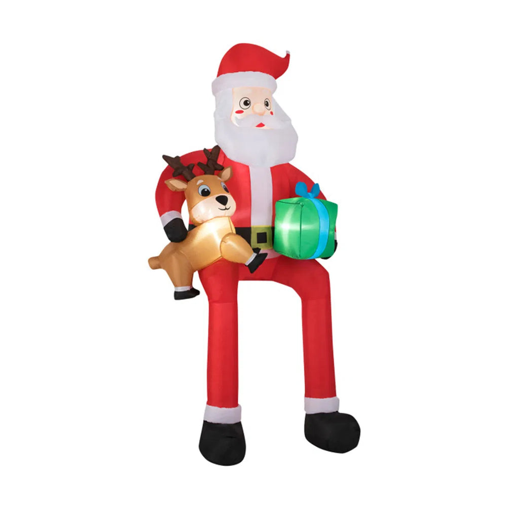 Giant inflatable sitting Santa with reindeer