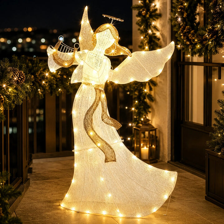 White fabric Christmas angel with lights