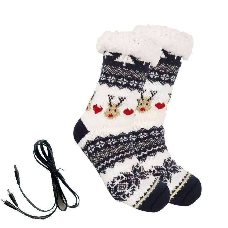 Red knitted Christmas socks with Santa pattern