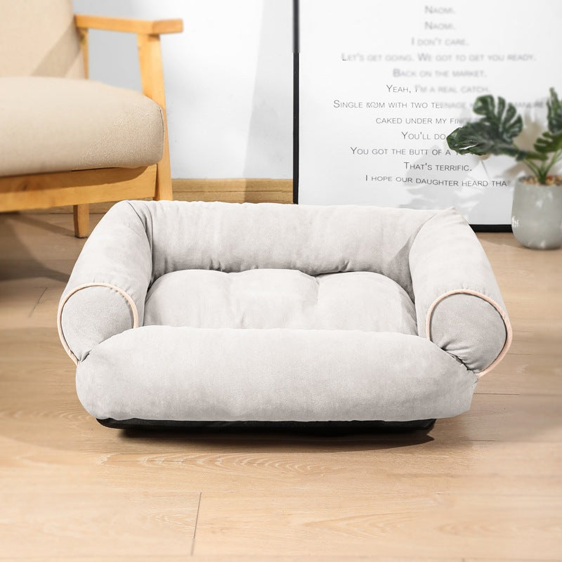 Plush sofa-style pet bed with bolsters