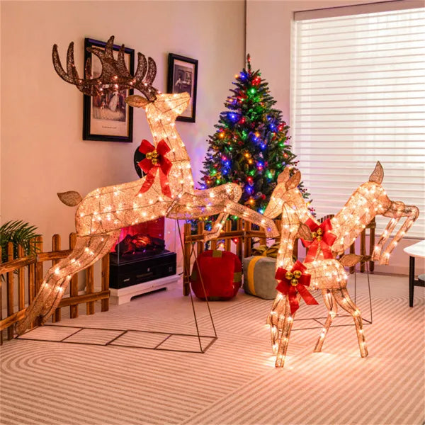 Three lighted glitter reindeer with red bows