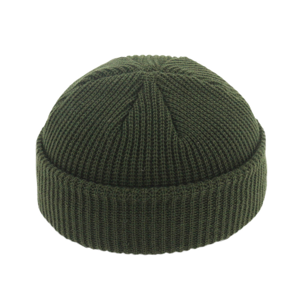Short ribbed fisherman beanie with turn-up cuff
