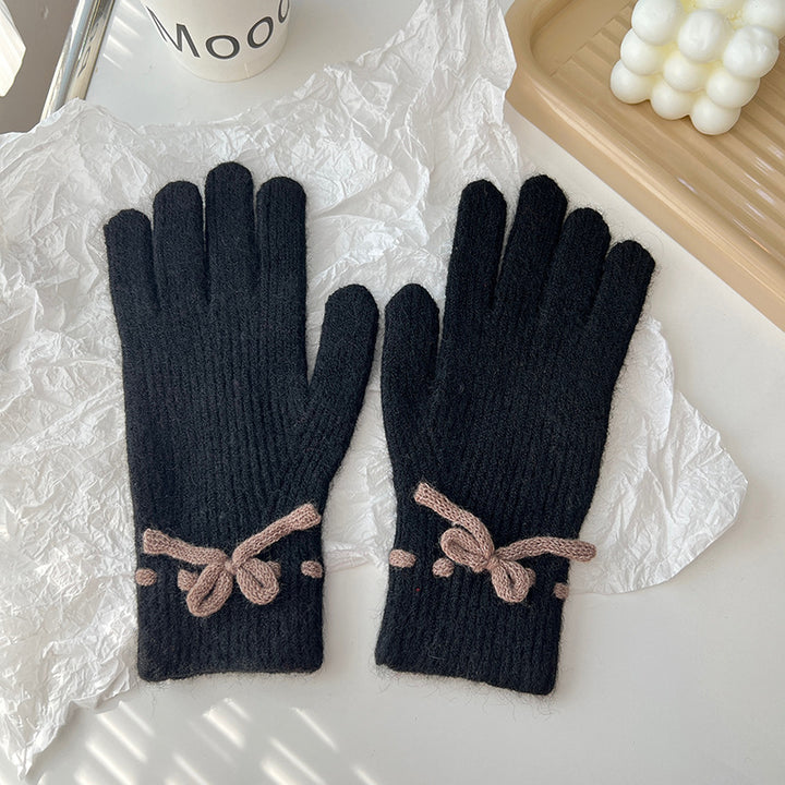 Pink ribbed knit gloves with bow