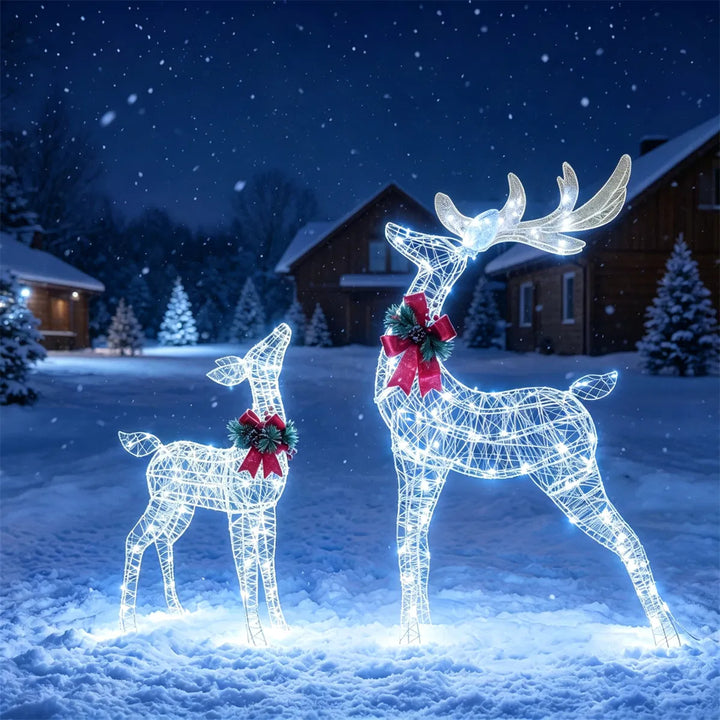 Two lighted glitter reindeer with red bows