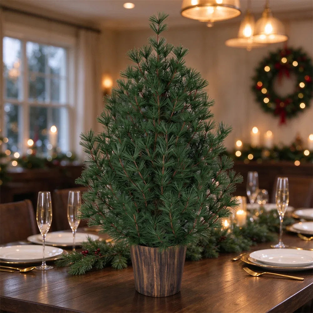 Small Christmas tree in vintage gold pot