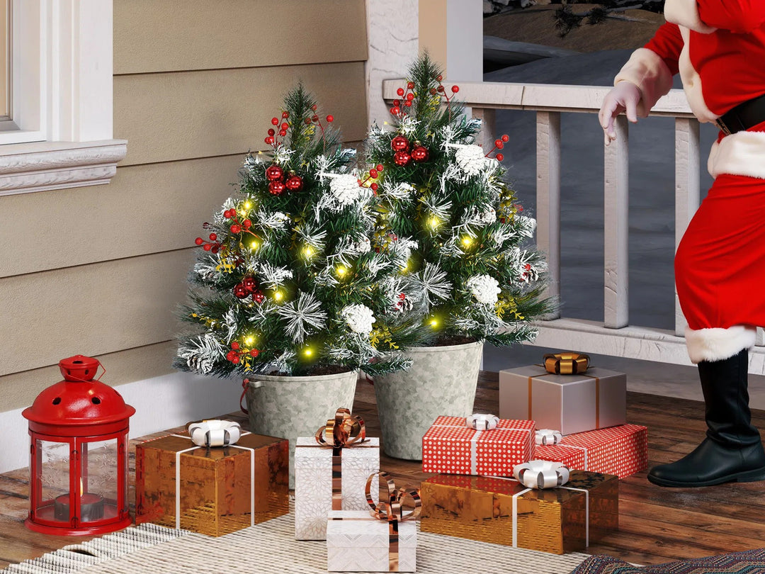Two small battery lit porch Christmas trees