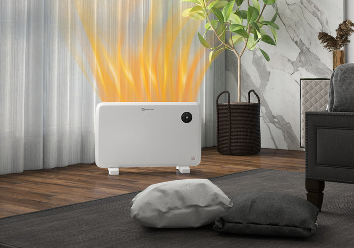 White slim panel heater mounted on a wall