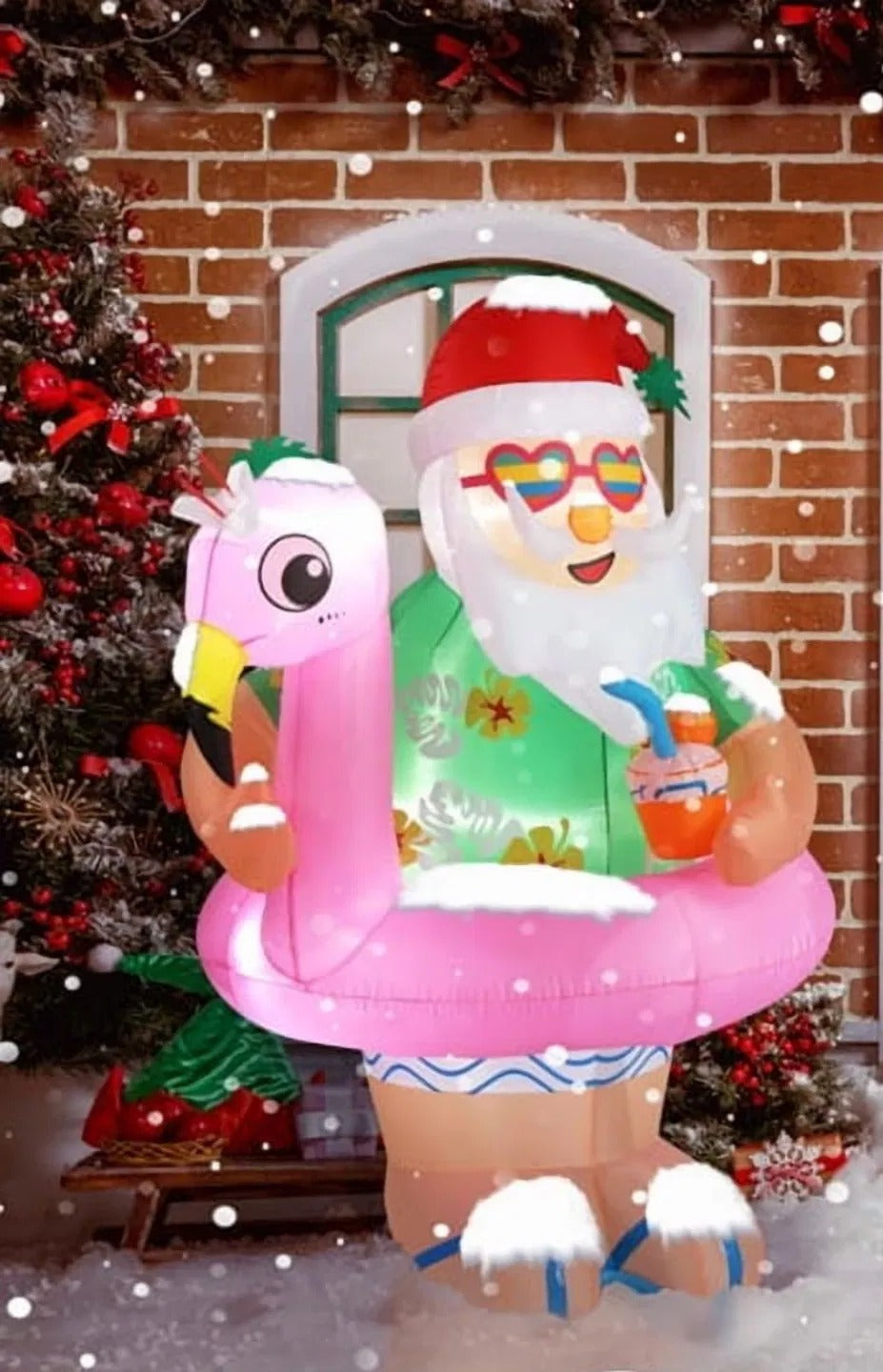 Inflatable Santa on pink flamingo float