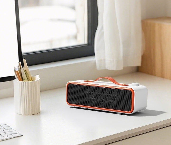 Slim horizontal ceramic desk heater