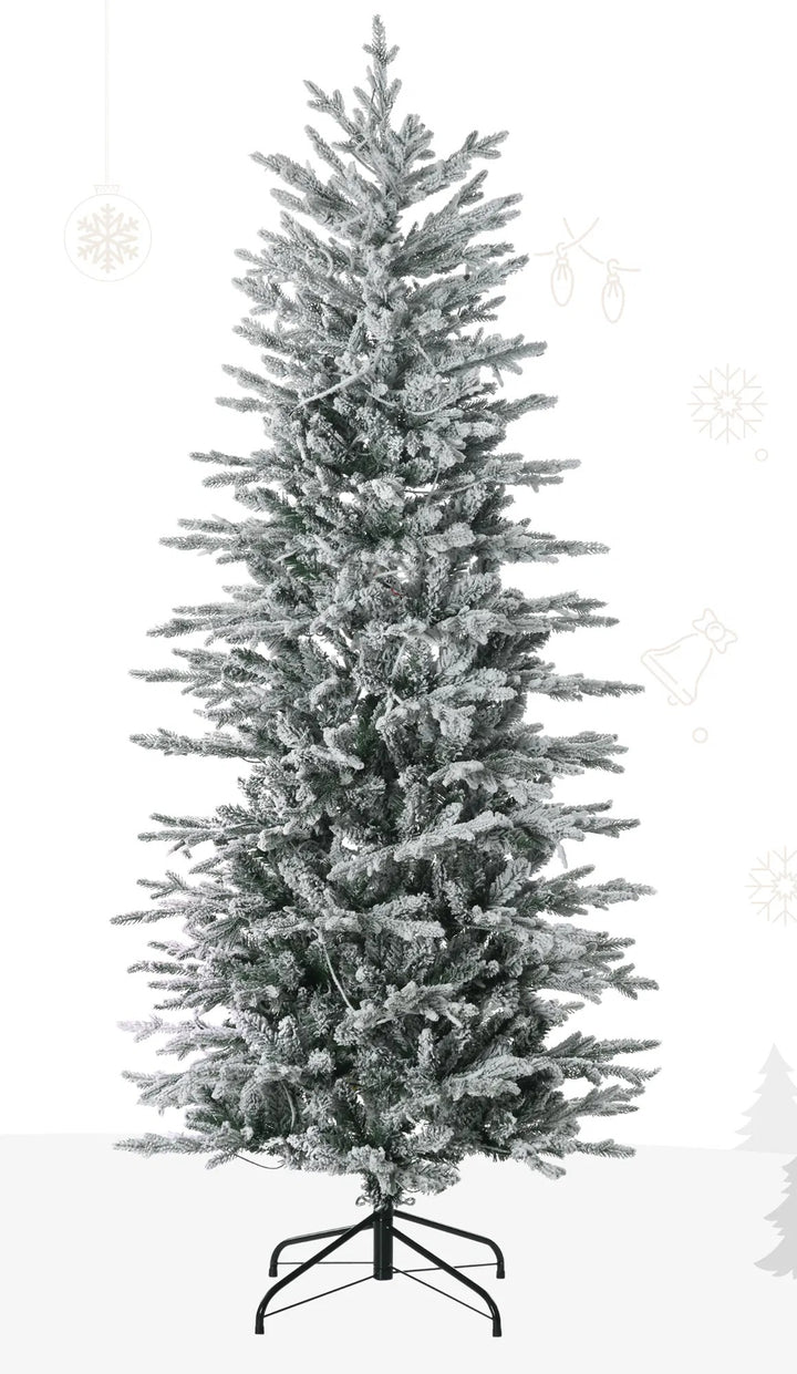 Snow flocked Christmas tree with clear lights