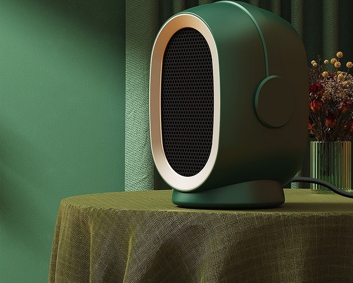 Compact ceramic space heater on desk