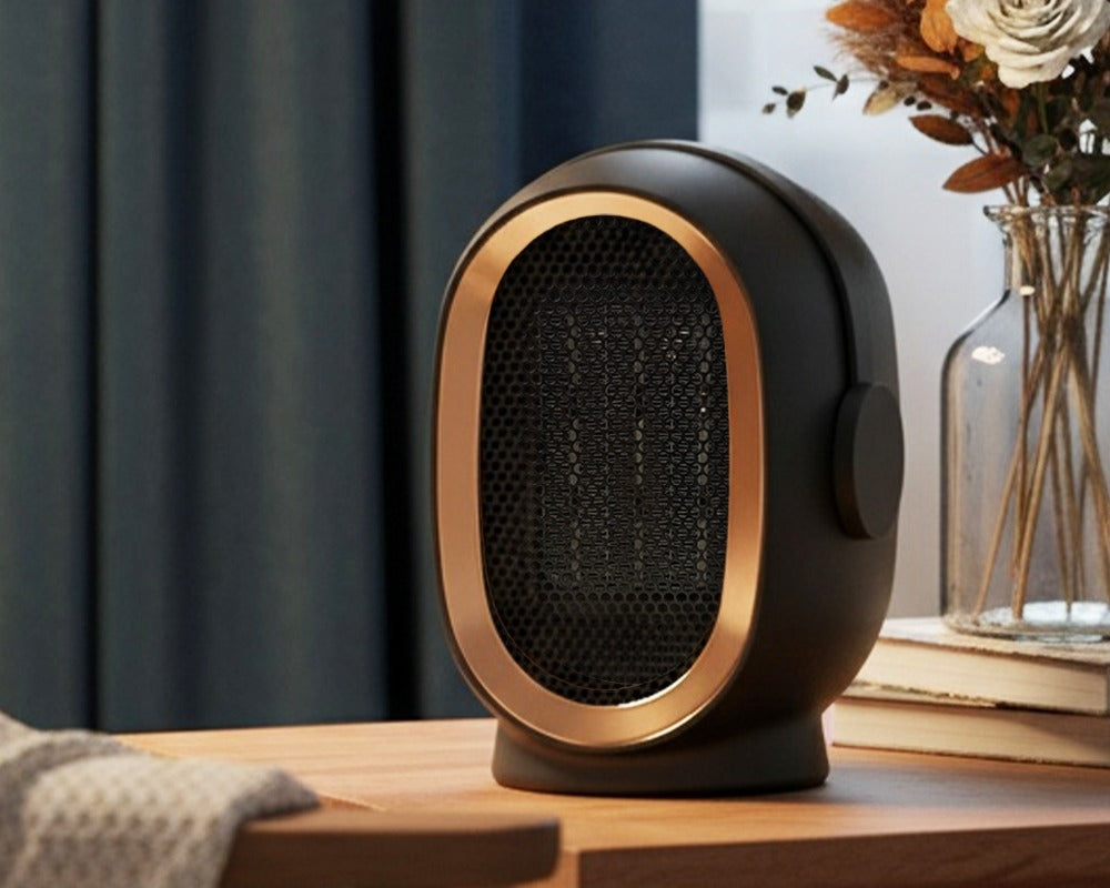 Compact ceramic space heater on desk