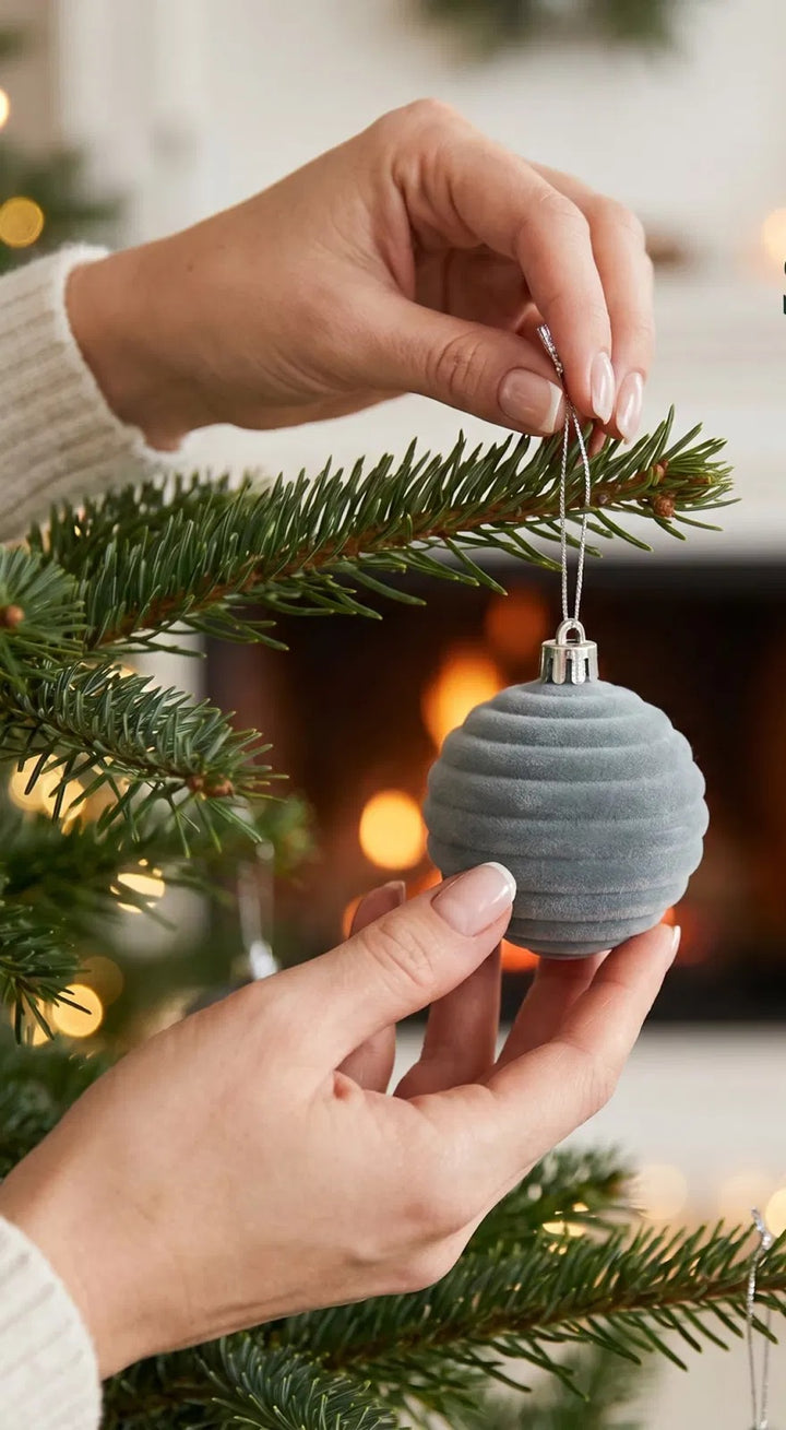 Gray velvet ball ornaments with silver caps