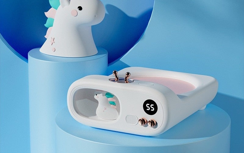 TV-shaped mug warmer with dinosaur figure