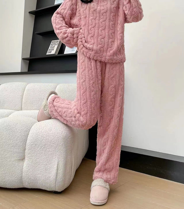 Woman in a half-zip fleece pajama set
