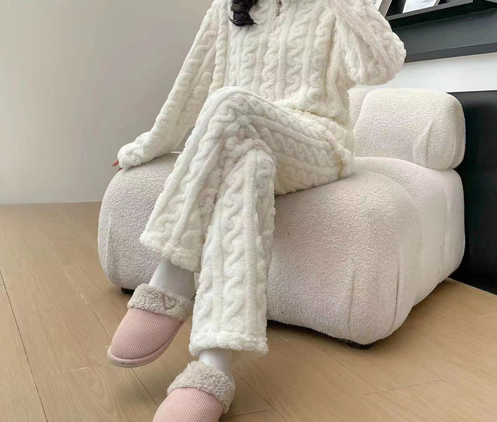 Woman in a half-zip fleece pajama set