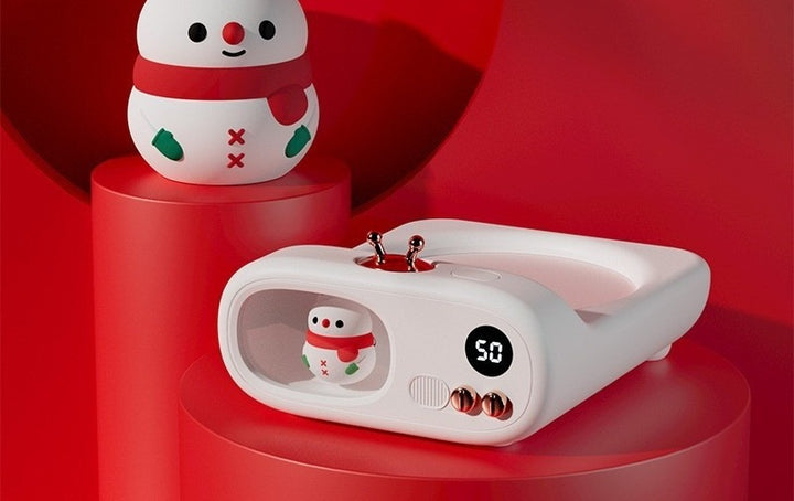 TV-shaped mug warmer with dinosaur figure