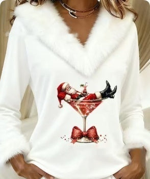 Woman in a Christmas martini print top