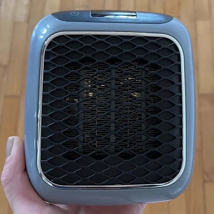 Compact portable heating device