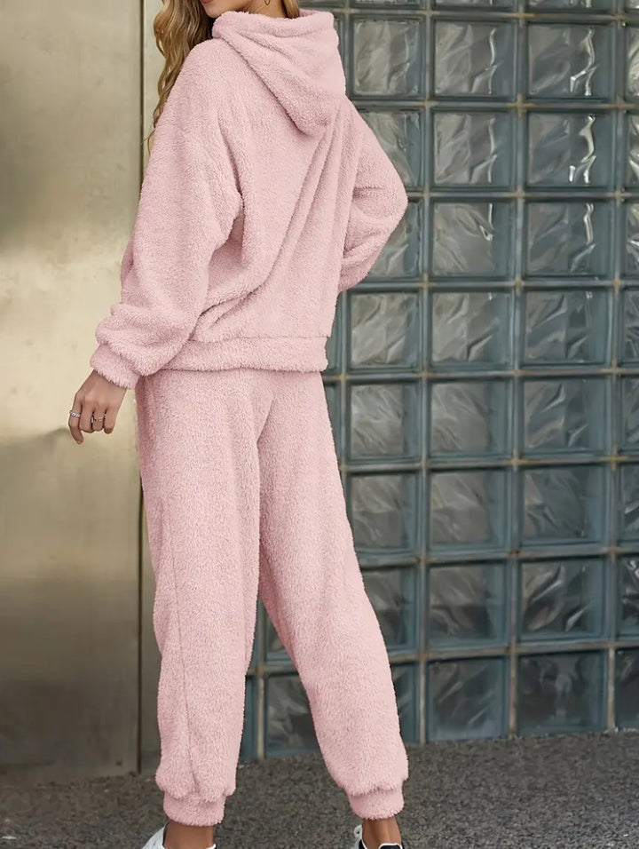 Woman in a fuzzy hoodie lounge set