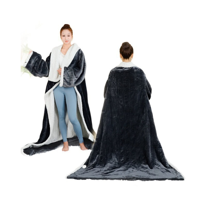 Person wearing sleeved electric heated blanket