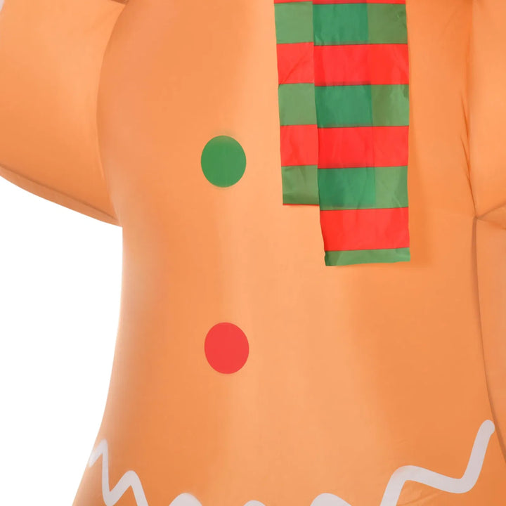 Giant inflatable gingerbread man with candy cane
