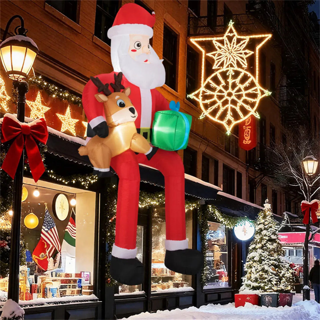 Giant inflatable sitting Santa with reindeer