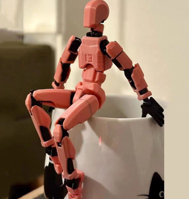 Orange poseable 3D printed robot figure