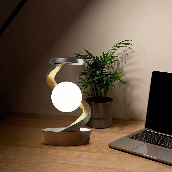 Rotating moon lamp on spiral stand