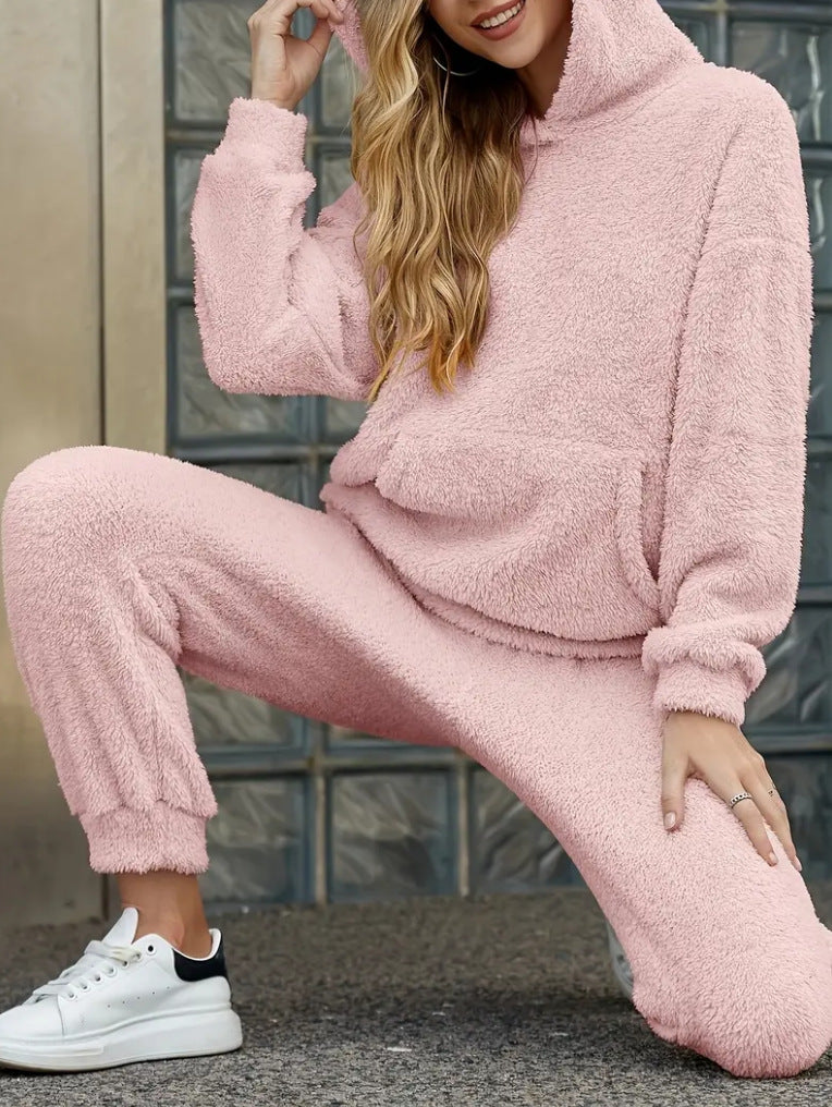 Woman in a fuzzy hoodie lounge set
