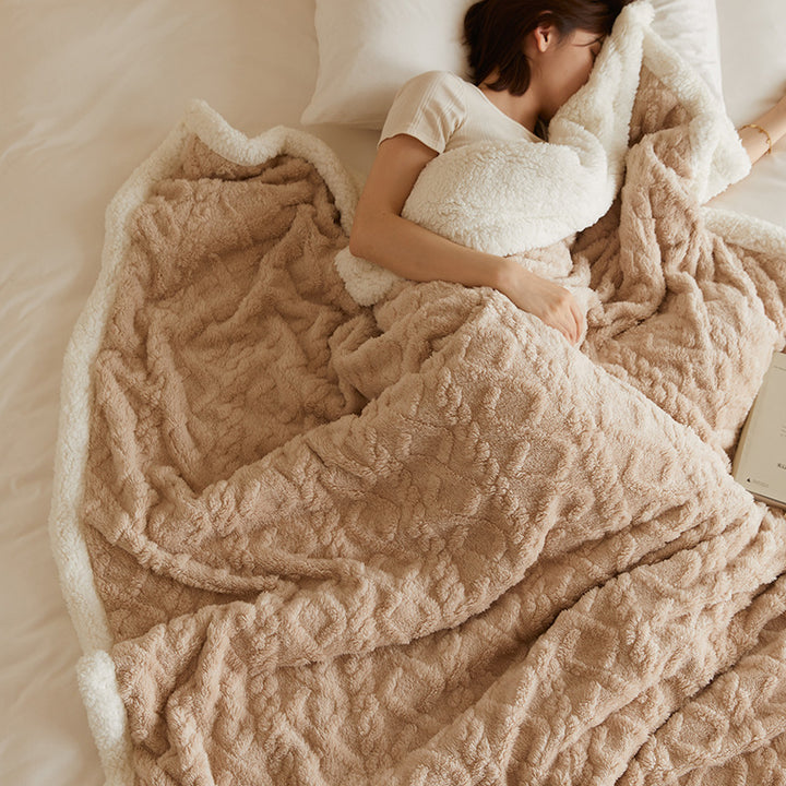 Tufted faux fur throw on a sofa