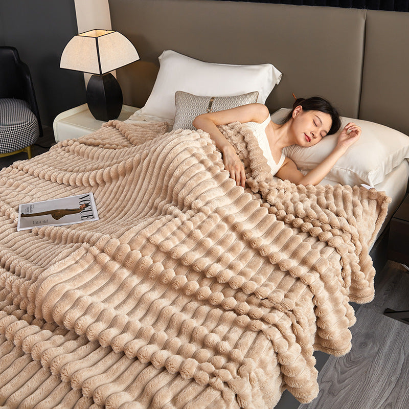 Bubble faux fur blanket with black trim