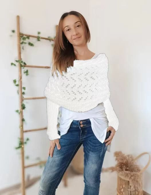 Woman wearing a knit shawl with sleeves
