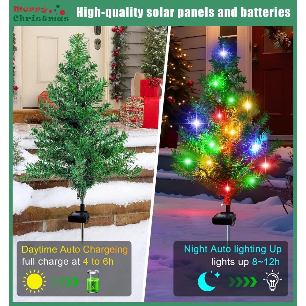 Four solar mini Christmas trees glowing along a path