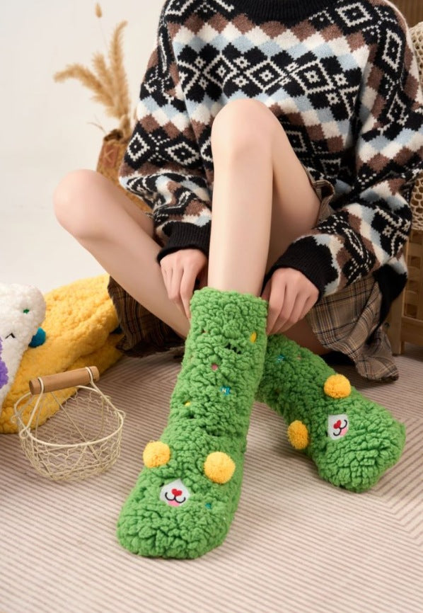 Fluffy pink floor socks with embroidered faces