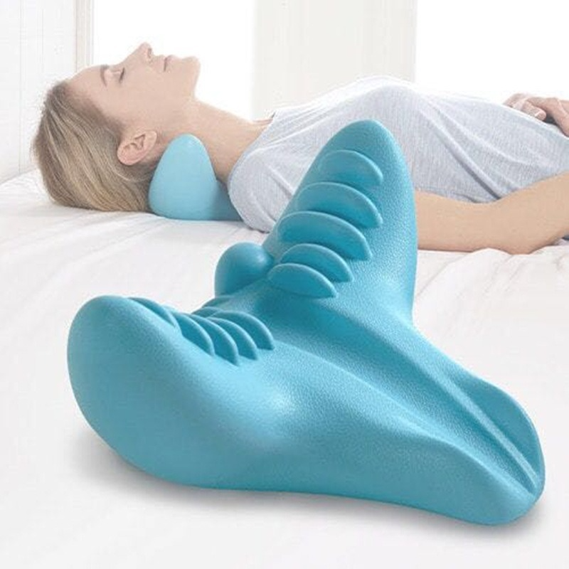 Contoured foam neck pillow with massage nodes