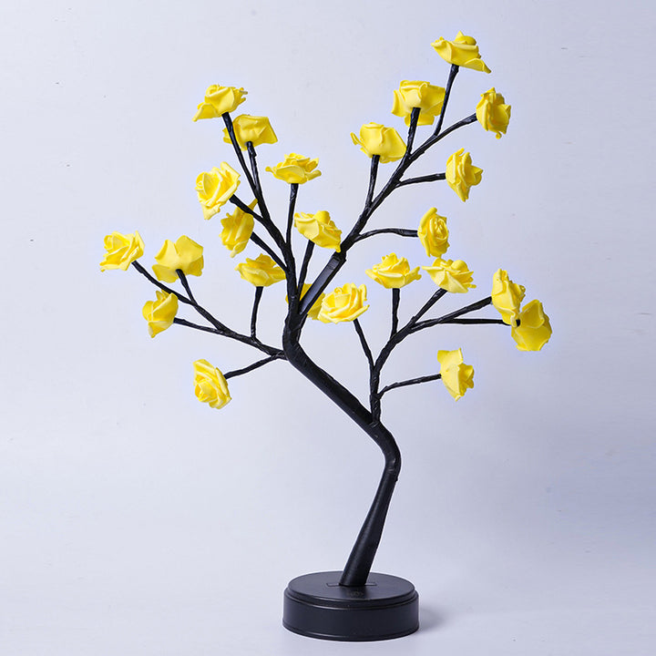 Glowing rose tree lamp on a table