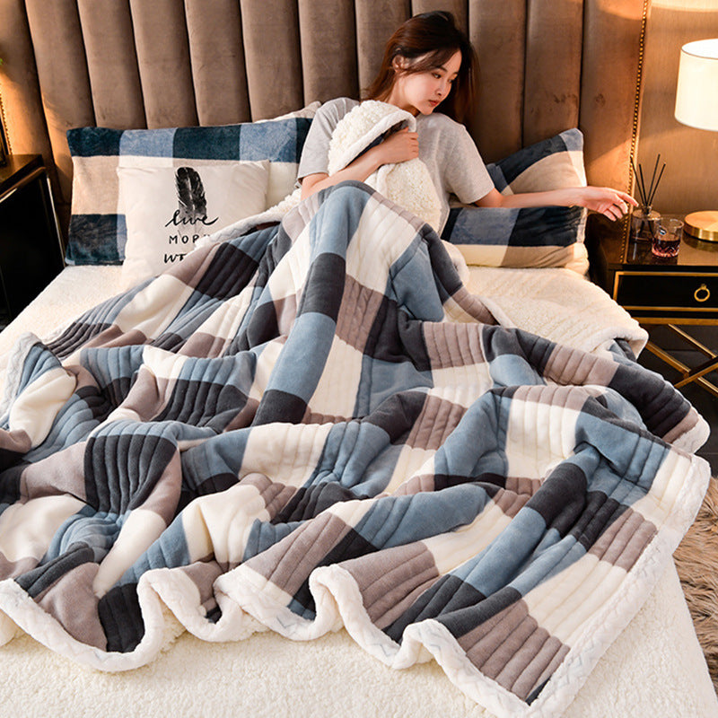 Three-layer quilted sherpa winter blanket