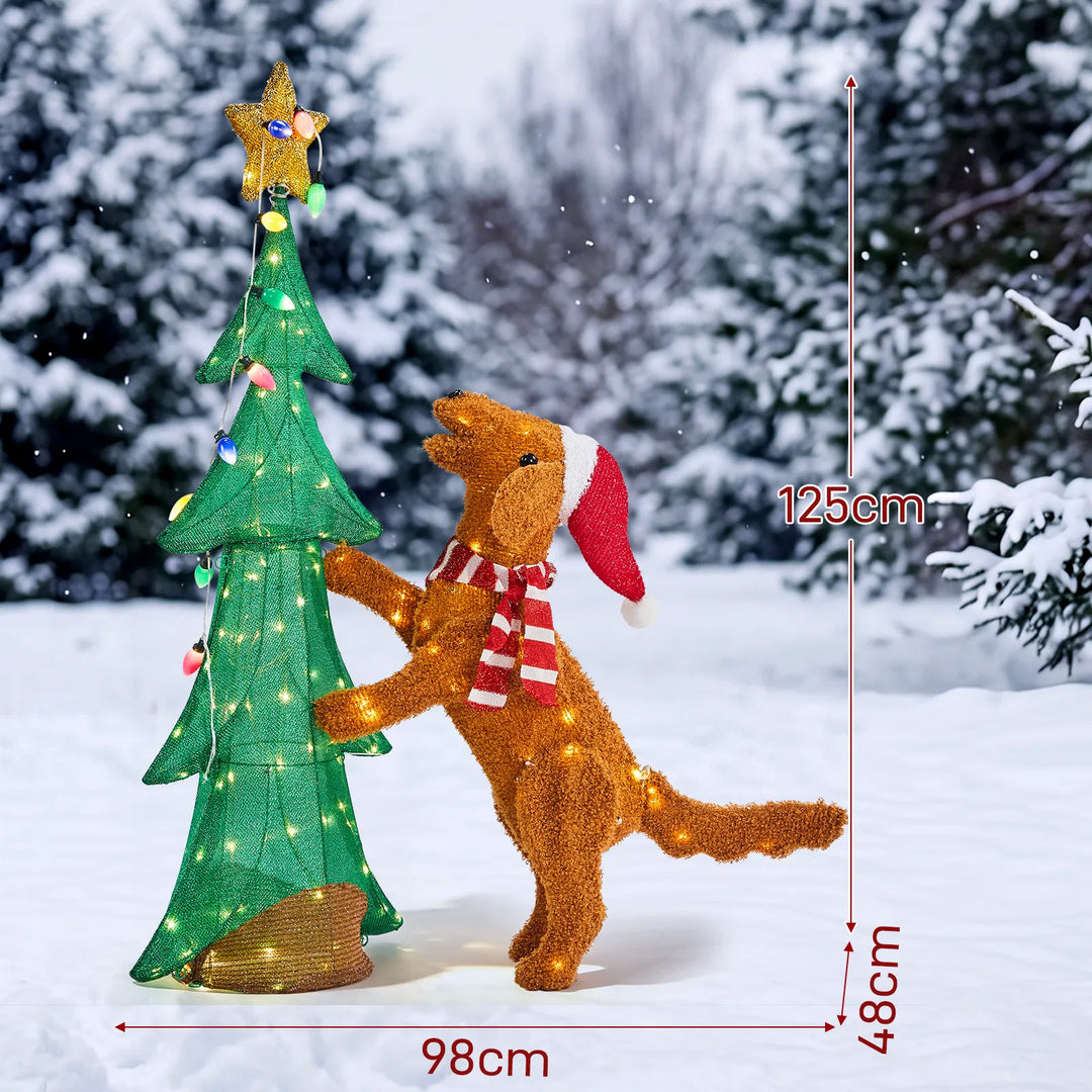 Light-up plush dog climbing Christmas tree