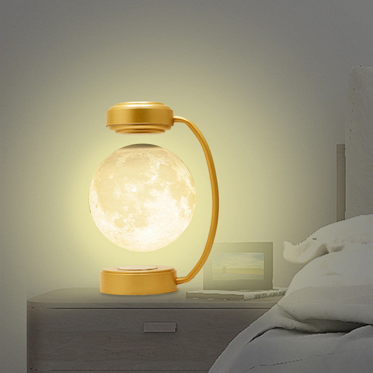 Floating moon lamp under arched holder