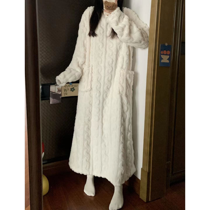 Woman in a long pink fleece nightgown