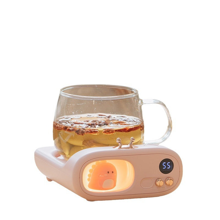 TV-shaped mug warmer with dinosaur figure