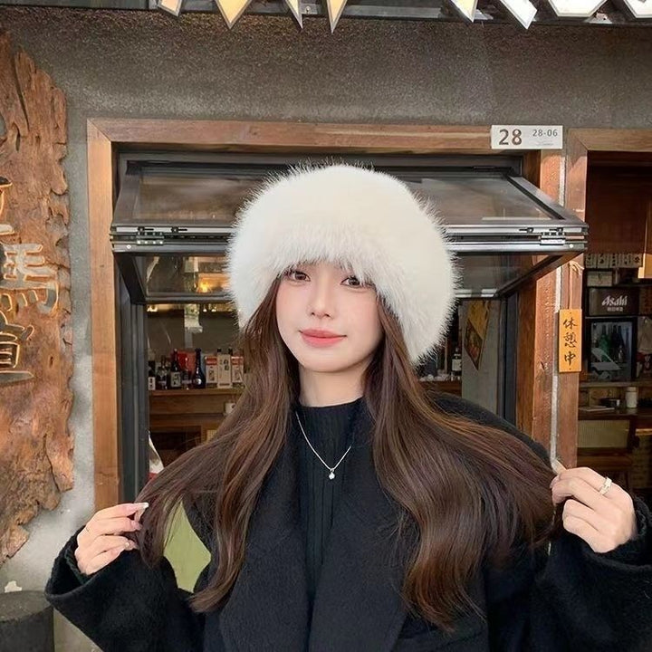 Fluffy beige faux fur roll-brim hat