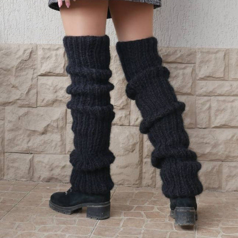 Chunky slouchy knit leg warmers over boots