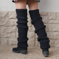 Chunky slouchy knit leg warmers over boots