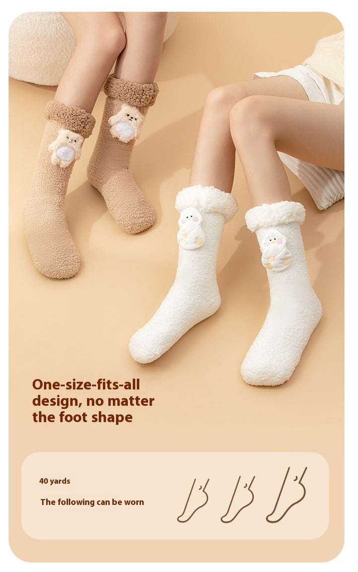 Plush heated socks with a pink deer badge