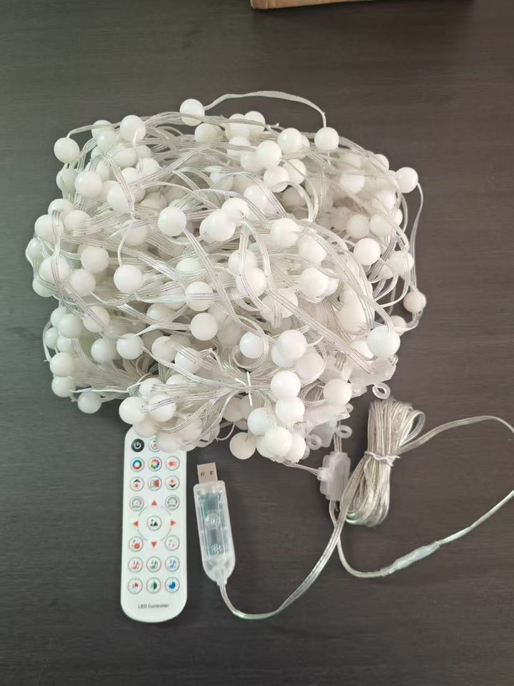 Smart LED curtain light showing a Christmas pattern