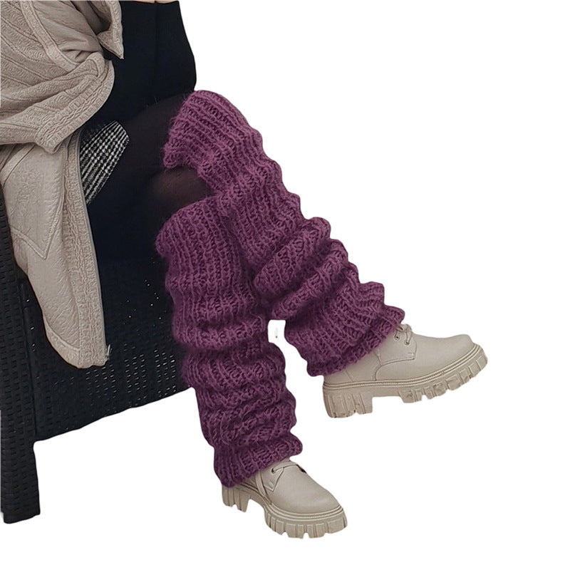 Chunky slouchy knit leg warmers over boots