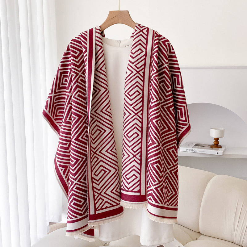 Woman wearing fringe shawl cape