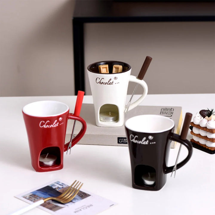 Ceramic fondue mug with fork and tealight